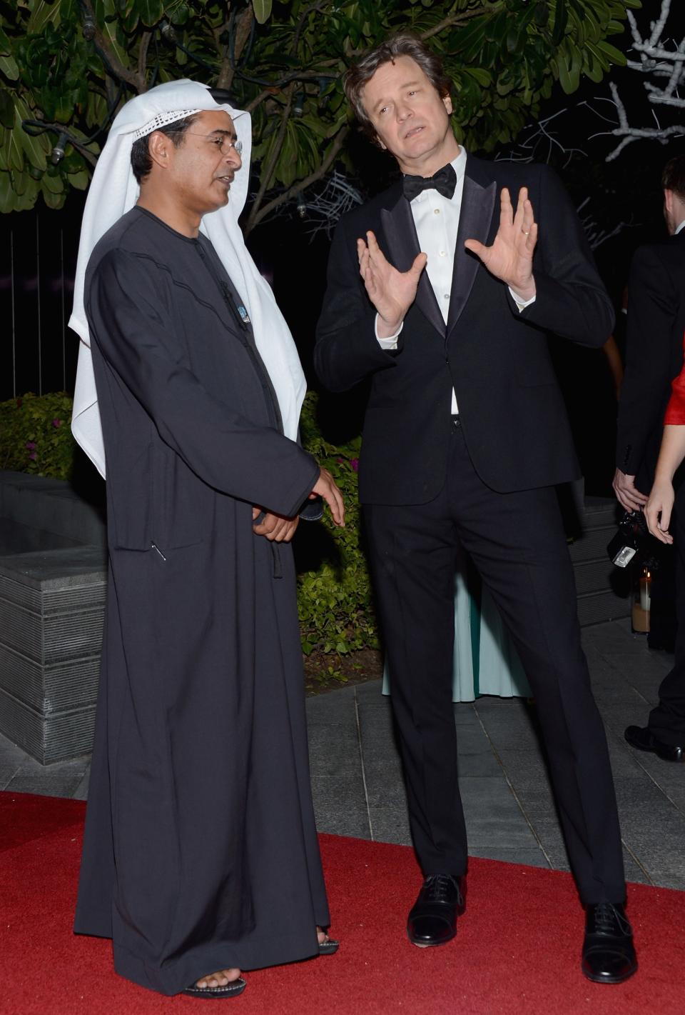 DUBAI, UNITED ARAB EMIRATES - DECEMBER 14: DIFF Chairman Abdulhamid Juma and actor Colin Firth attend the 2012 Dubai International Film Festival, Dubai Cares and Oxfam "One Night to Change Lives" Charity Gala at the Armani Hotel on December 14, 2012 in Dubai, United Arab Emirates. (Photo by Andrew H. Walker/Getty Images for DIFF)