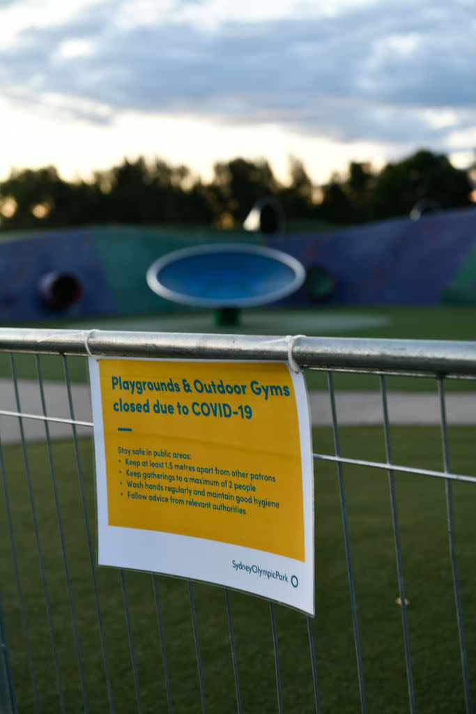 An information signboard is seen on outdoor playground at Sydney Olympic Park.