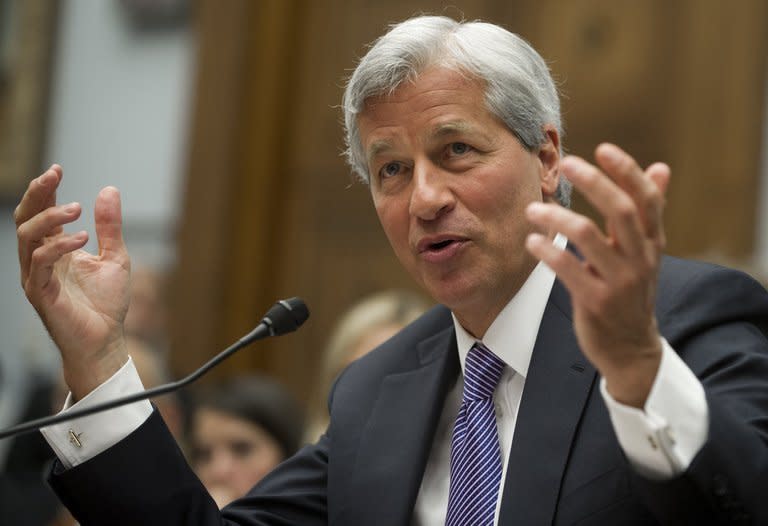 JPMorgan Chase Chairman and CEO Jamie Dimon testifies on Capitol Hill in Washington, DC on June 19, 2012. The firm's board of directors approved an unchanged annual salary of $1.5 million for Dimon and cut his bonus to $10 million, compared with $21.5 million for 2011