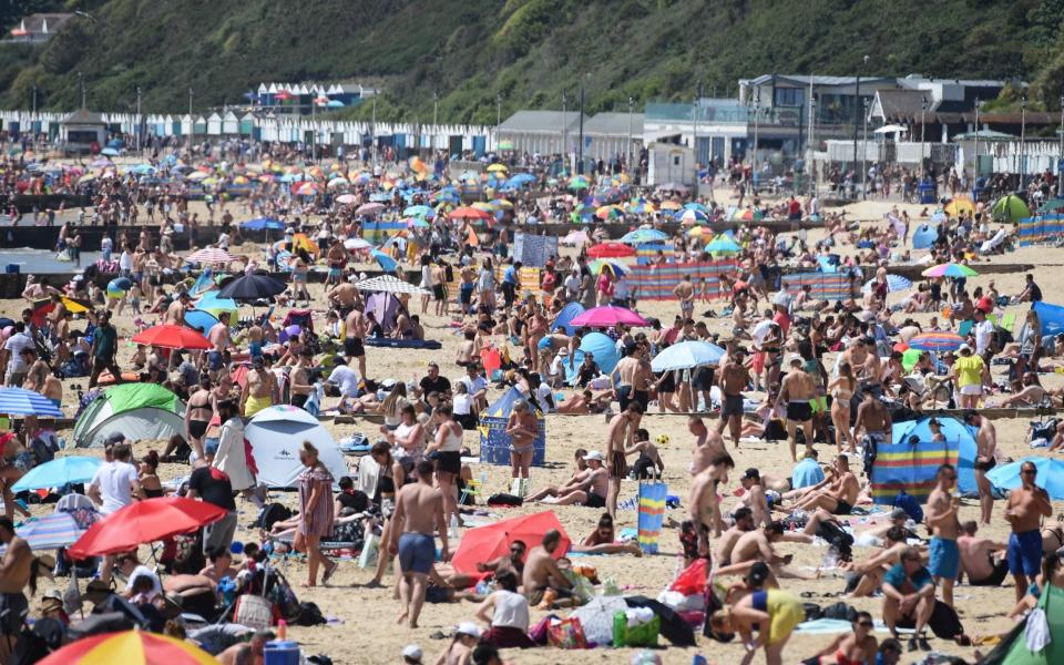 The beachThe Monday sunshine saw people flocking to the Dorset resort of Bournemouthes were packed - Getty