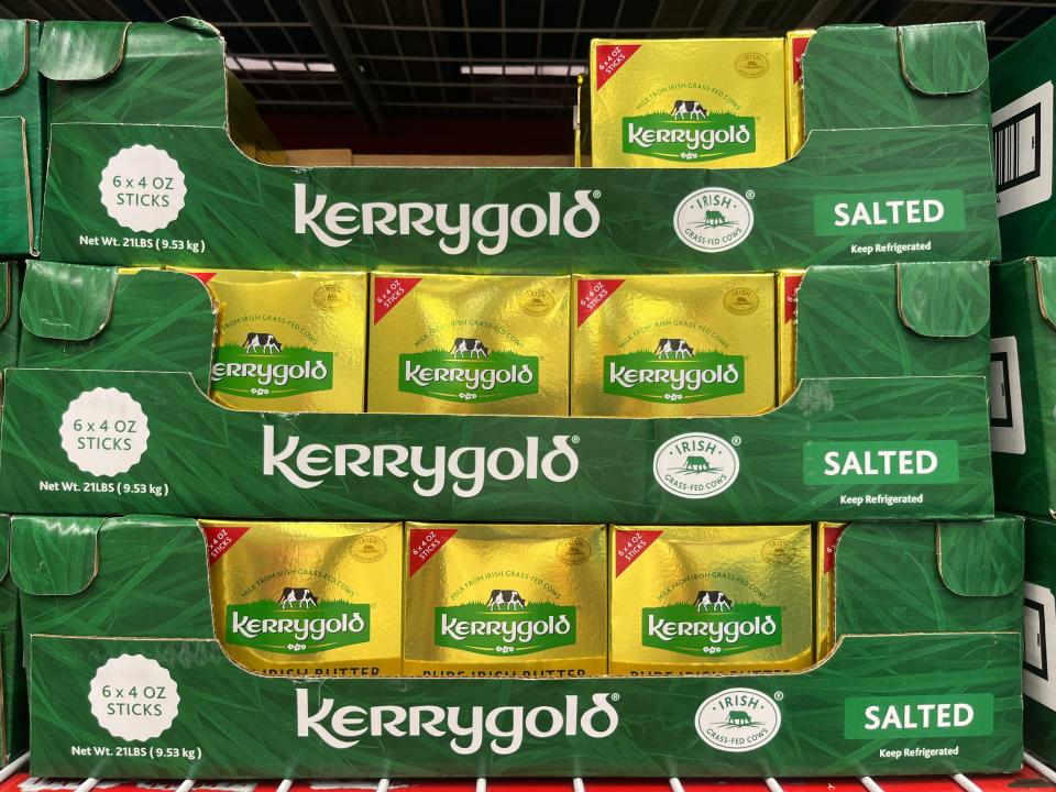 Cardboard display of Kerrygold butter filled with gold bricks of the butter