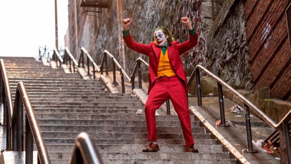 Greenfield's business made costumes for a number of Hollywood productions, including the red suit and orange waistcoast Joaquin Phoenix wore in the 2019 film "Joker." - Niko Tavernise/Warner Bros. Entertainment