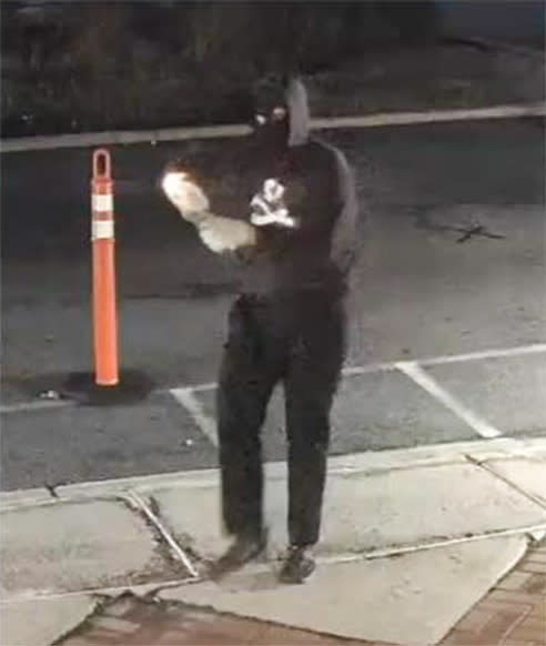 Police are searching for a man who threw a Molotov cocktail at a New Jersey synagogue. (Bloomfield Division of Public Safety)