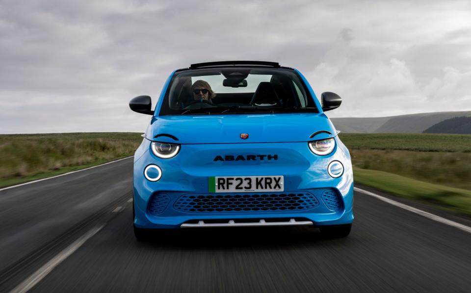 At just over 1.4 tonnes, the Abarth 500e punches forward pretty well – though the effect is spoiled by the wind noise  from the fabric roof