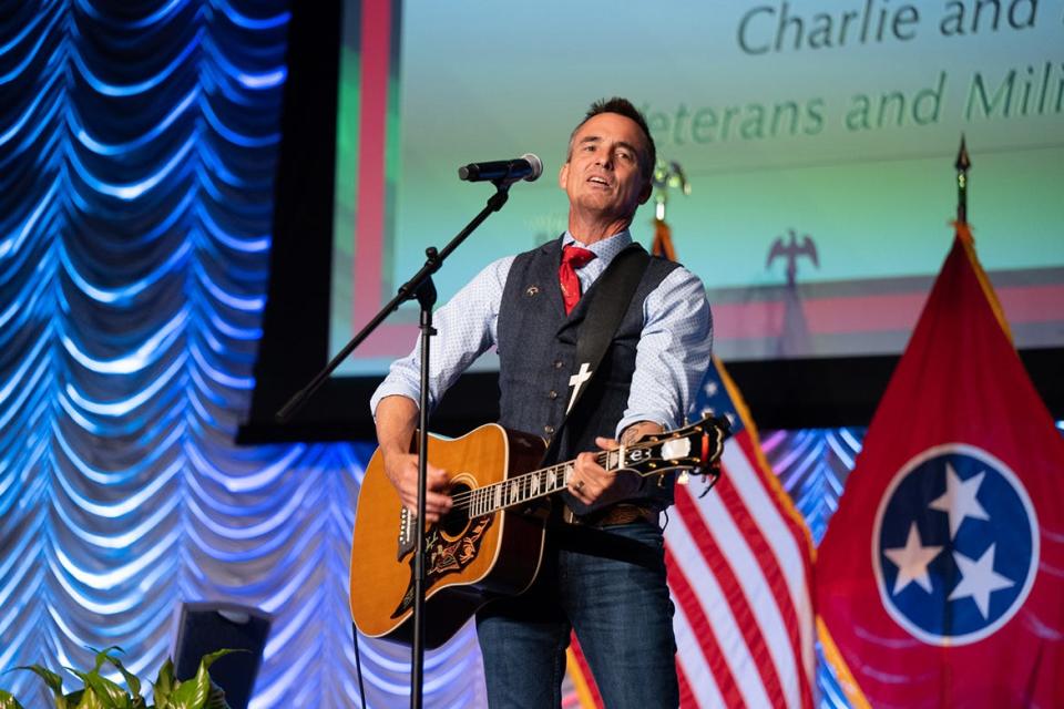 Combat veteran and entertainer Keni Thomas performs the song, "Not Me," to wrap up his one-hour storytelling and music performance during the fifth annual Veteran Impact Celebration at MTSU in the Student Union Ballroom. A recipient of a Bronze Star for valor and American Patriot Award, Thomas was part of special operations in Somalia in 1993. Outnumbered 10 to one, the 160 men of Task Force Ranger distinguished themselves in an 18-hour battle. Nineteen U.S. soldiers died; 78 were wounded.
