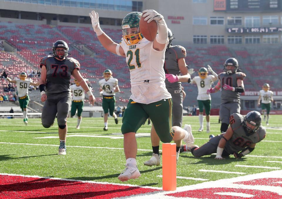 Edgar High School's Karter Butt (21) rushes for a third quarter touchdown against Black Hawk/Warren High School during their Division 7 state championship football game on Thursday, November 16, 2023, at Camp Randall Stadium in Madison, Wis. Edgar defeated Black Hawk/Warren 36-6.
Wm. Glasheen USA TODAY NETWORK-Wisconsin