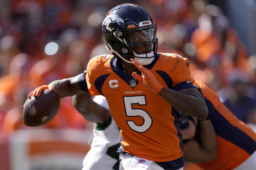 Denver Broncos quarterback Teddy Bridgewater (5) scrambles against the New York Jets.