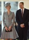 Britain's Catherine, Duchess of Cambridge and Prince William smile during a ceremonial welcome for the President of Singapore Tony Tan, and his wife, at Horse Guards Parade in London October 21, 2014. The President and his wife will be guests of Queen Elizabeth during the first state visit of a Singapore President to Britain. REUTERS/Toby Melville (BRITAIN - Tags: POLITICS ROYALS ENTERTAINMENT TPX IMAGES OF THE DAY)