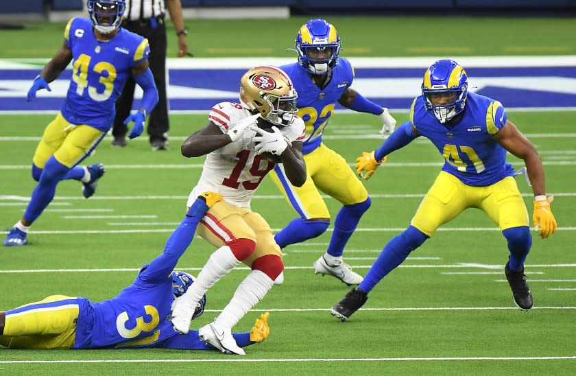 INGLEWOOD, CALIFORNIA NOVEMBER 29, 2020- 49ers receiver Deebo Samuel picks up yards.