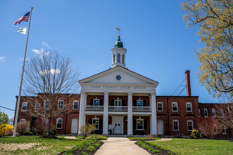 York County Court House in Alfred, Maine April 26, 2021. Bob Woodsome, 73, owner of Woodsome Lumber, sent three of his workers at the time to pick up the now-headless statue body the day after it was destroyed by local kids on Halloween night near the York County Superior Court steps in Alfred.