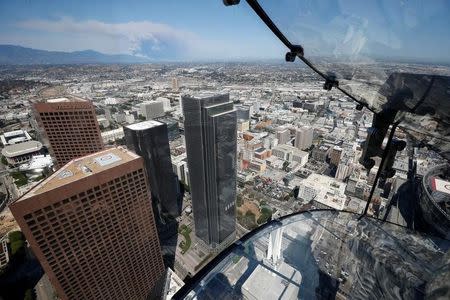 The Skyslide is seen on the 69th and 70th floors of the U.S. Bank Tower which is attached to the OUE Skyspace LA observation deck in downtown Los Angeles, California, U.S. June 20, 2016. REUTERS/Lucy Nicholson - RTX2H9XQ