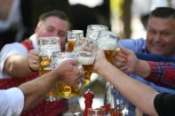 Beer garden guests salute near Theresienwiese where Oktoberfest would have started