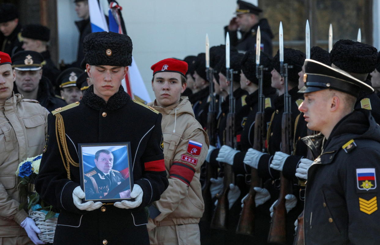 Sailors attend a memorial for Capt. Andrei Paliy, Russia's Black Sea Fleet deputy commander.
