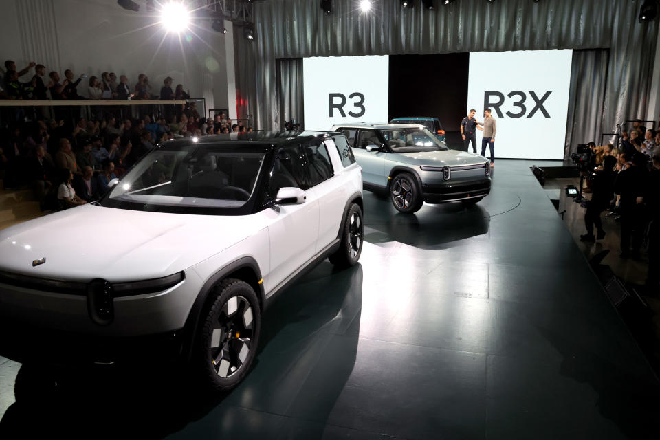 LAGUNA BEACH, CA - MARCH 07: The Rivian R3 and R3X SUVs are on display during the Rivian Reveals All-Electric R2 Midsize SUV event at the Rivian South Coast Theater on March 07, 2024 in Laguna Beach, California.  (Photo by Philip Faraone/Getty Images for Rivian)