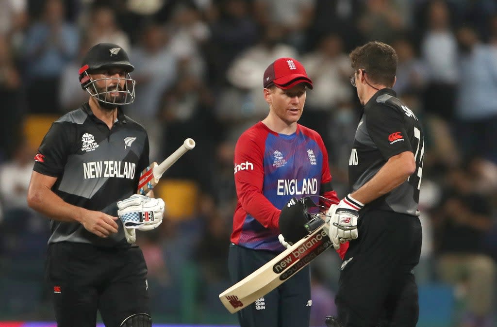 Eoin Morgan congratulates Mitchell Santner after New Zealand’s win (PA) (PA Wire)