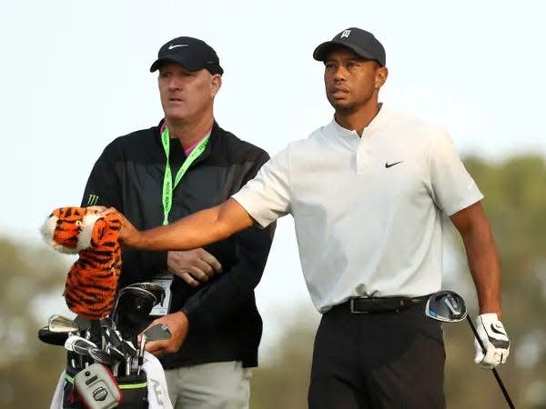 Tiger Woods and his caddie