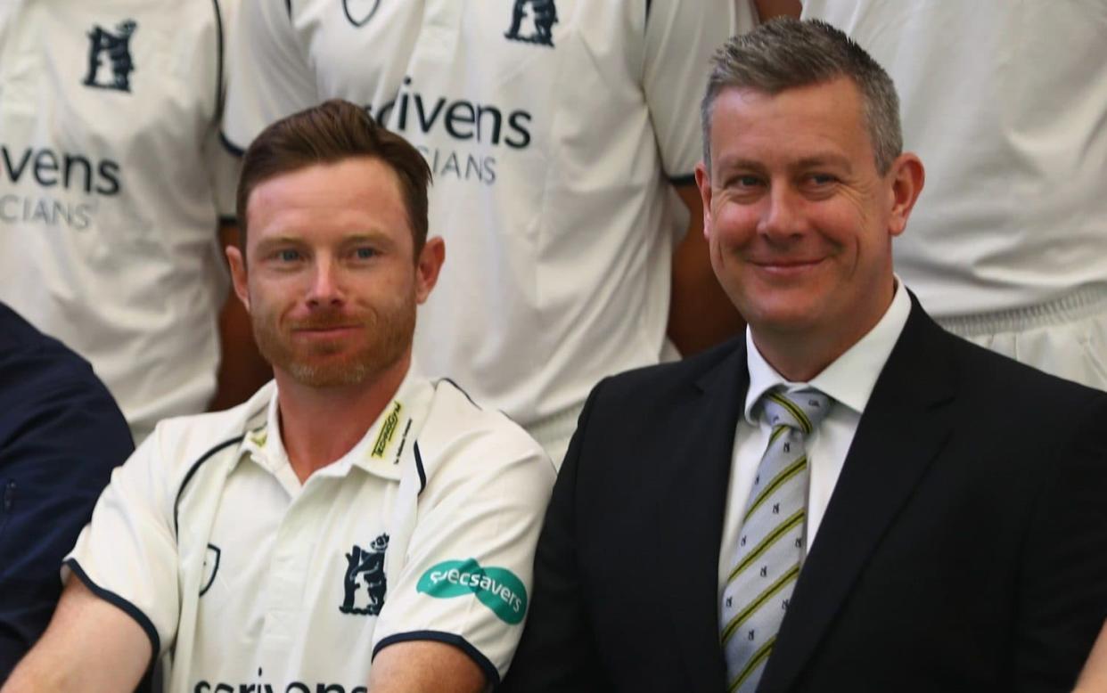 Giles (right) pictured with Warwickshire captain Ian Bell - Getty Images Europe