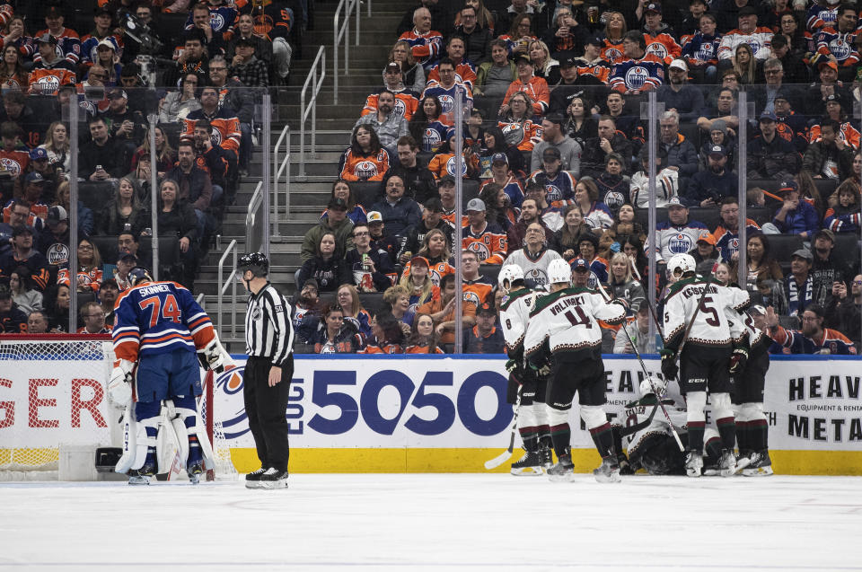 Arizona Coyotes players celebrate a goal against the Edmonton Oilers during the second period of an NHL hockey game in Edmonton, Alberta, Wednesday, March 22, 2023. (Jason Franson/The Canadian Press via AP)