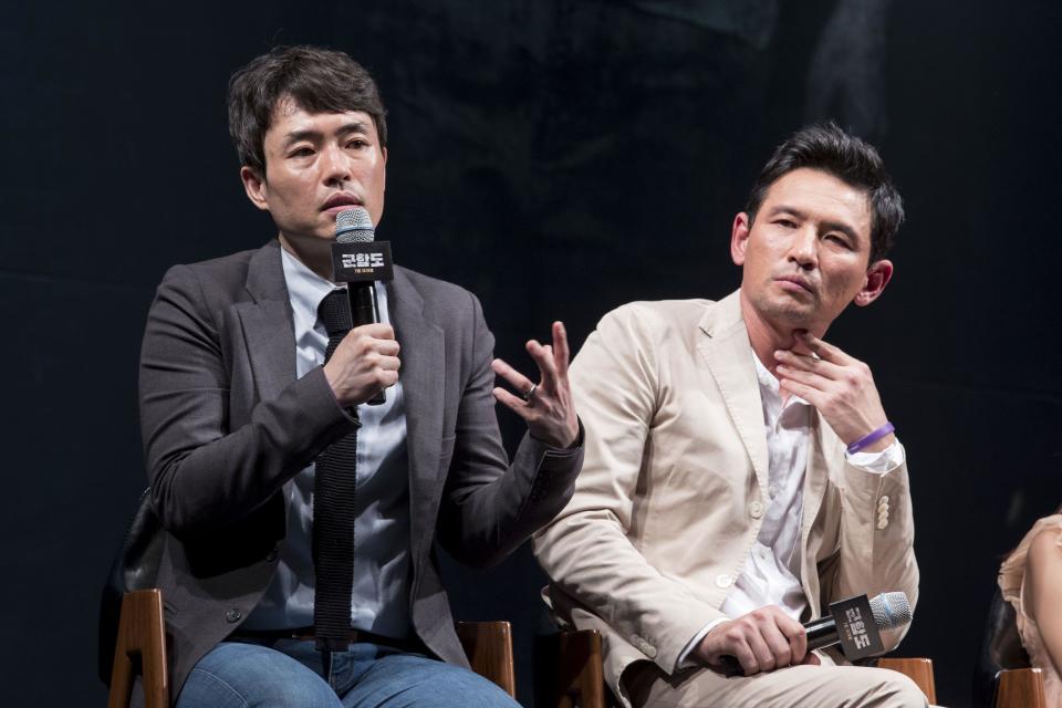 26 June 2017 - Seoul, South korea : (L to R) South Korean director Ryoo Seung-wan and actor Hwang Jung-min, attend a photo call for the film 'The Battleship Island' showcase in Seoul, South Korea on June 26, 2017. The movie about a group of about 400 Joseon workers who risk their lives to attempt an escape from Hashima, and the story of forced labor on the island. will appear on South Korea screens starting on July. Photo Credit: Lee Young-ho *** Please Use Credit from Credit Field ***