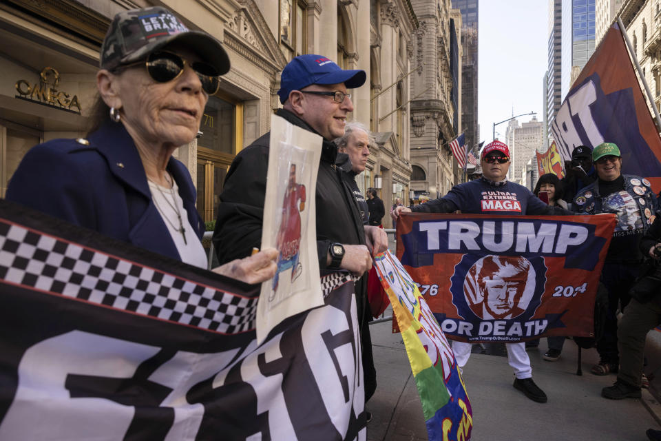 Supporters of former President Donald Trump protest outside Trump Tower in New York, Monday, April. 3, 2023. (AP Photo/Yuki Iwamura)