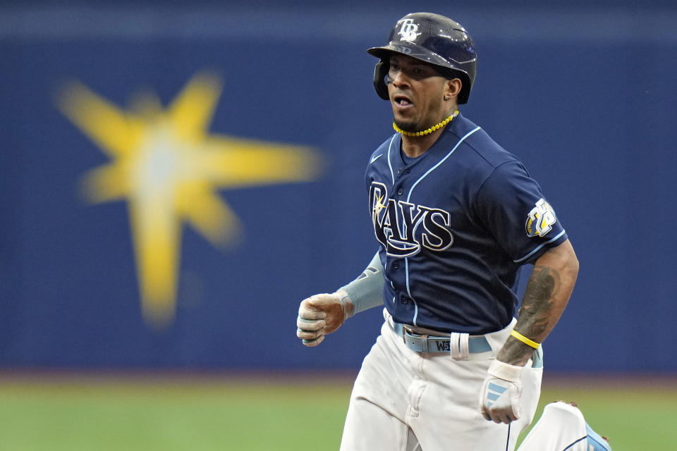 Tampa Bay Rays' Wander Franco goes into third base with a triple off Toronto Blue Jays starting pitcher Alek Manoah during the first inning of a baseball game Thursday, May 25, 2023, in St. Petersburg, Fla. (AP Photo/Chris O'Meara)