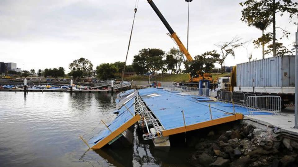 A ramp built for competitors' boats to reach the water hangs after collapsing at the Marina da Gloria sailing venue just days before the start of the Olympic Games. Photo: Reuters