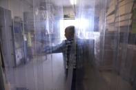 David Cox, managing director of Fragrances of Ireland walks through his perfume warehouse in Wicklow, Ireland May 3 2016. REUTERS/Clodagh Kilcoyne