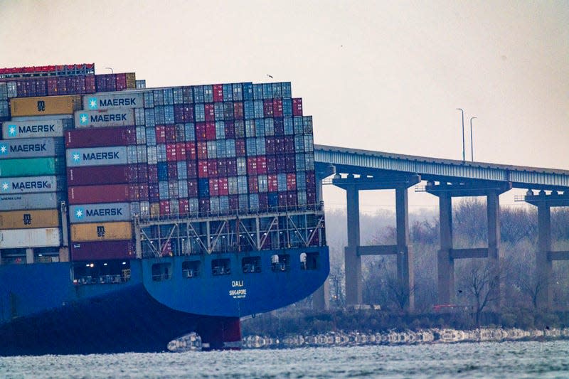 Cargo ship Dali sits in the water after running into and collapsing Baltimore’s Francis Scott Key Bridge on March 27, 2024 in Baltimore, Maryland. Two survivors were pulled from the Patapsco River and six missing people are presumed dead after the Coast Guard called off search and rescue efforts. A work crew was fixing potholes on the bridge, which is used by roughly 30,000 people each day, when the ship struck at around 1:30am on Tuesday morning. The accident has temporarily closed the Port of Baltimore, one of the largest and busiest on the East Coast of the U.S. - Photo: Tasos Katopodis (Getty Images)