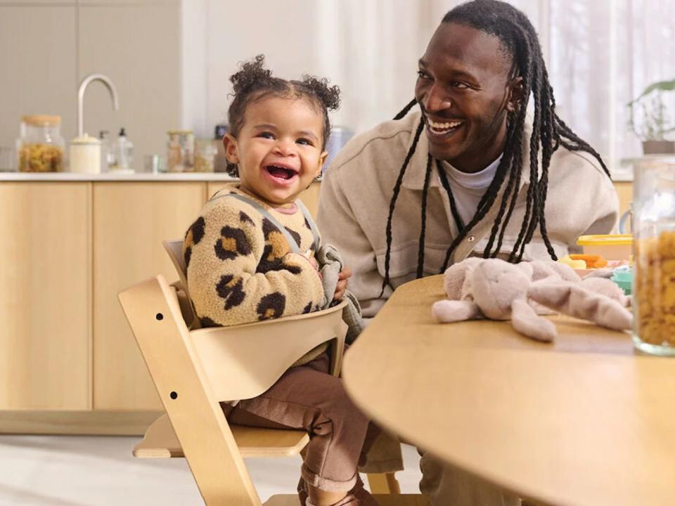 Dad and baby using high chair