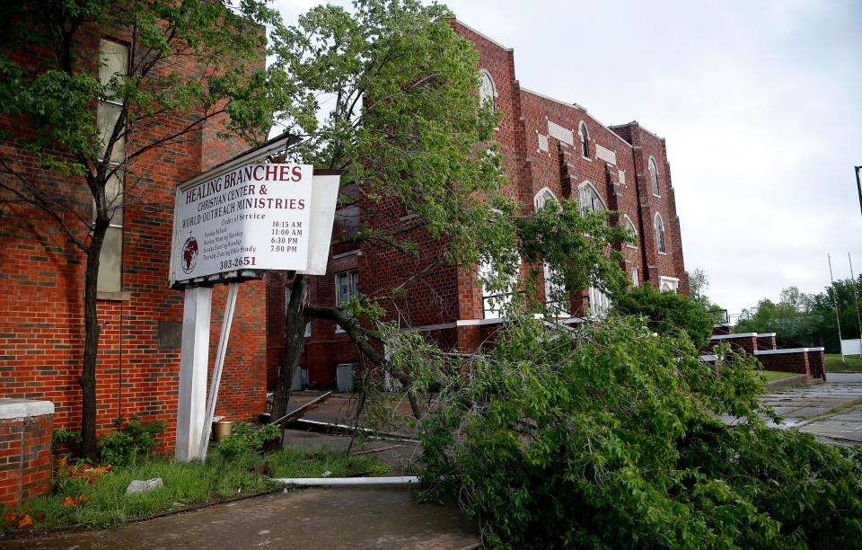 Limbs littered the area around the Healing Branches Christian Center and World Outreach Ministries in Seminole after a tornado struck the town east of Oklahoma City on Wednesday.