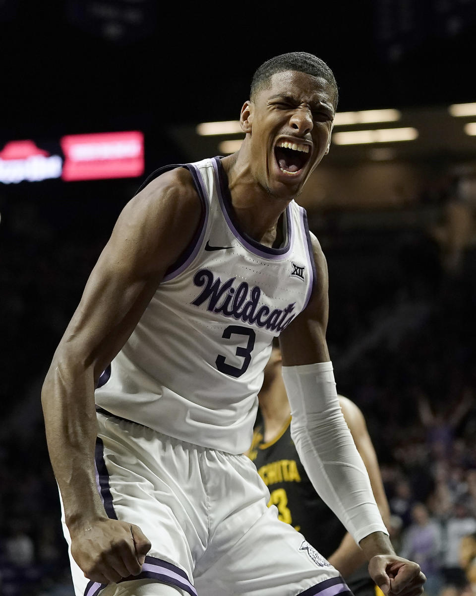 Kansas State forward David N'Guessan celebrates after making a basket during the first half of an NCAA college basketball game against Wichita State Saturday, Dec. 3, 2022, in Manhattan, Kan. (AP Photo/Charlie Riedel)