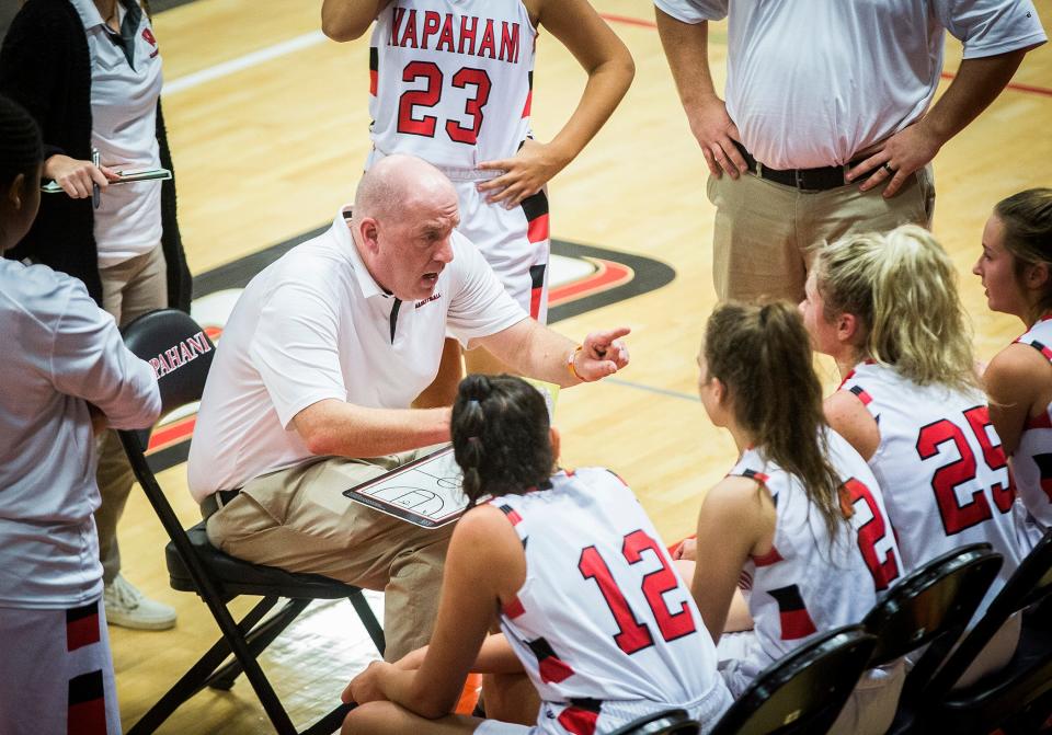 Wapahani head coach Scott Hudson gives instructions during a timeout against Blue River during their game at Wapahani High School Tuesday, Nov. 30, 2021.