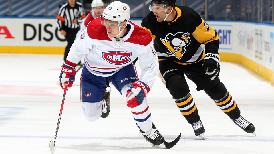 TORONTO, ONTARIO - AUGUST 01: Max Domi #13 of the Montreal Canadiens skates with the puck against Jack Johnson #3 of the Pittsburgh Penguins during the first period of Game One of the Eastern Conference Qualification Round at Scotiabank Arena on August 01, 2020 in Toronto, Ontario. (Photo by Chase Agnello-Dean/NHLI via Getty Images)