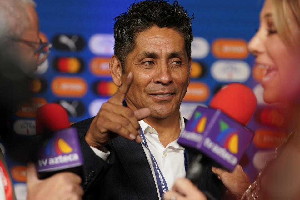 Retired Mexican soccer goalkeeper and striker Jorge Campos talks to journalists prior to the draw ceremony for the Copa America soccer tournament, Thursday, Dec. 7, 2023, in Miami. The 16-nation tournament will be played in 14 U.S. cities starting with Argentina's opener in Atlanta on June 20, 2024. (AP Photo/Lynne Sladky)
