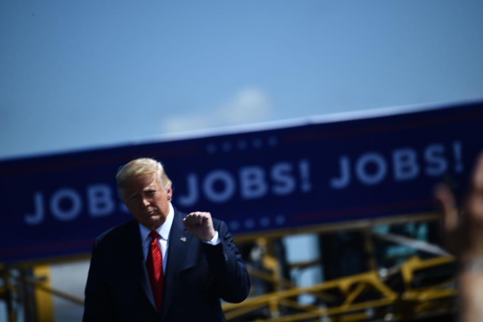 President Donald Trump says he'll have to rebuild the U.S. economy a second time at Mankato Regional Airport on Aug. 17 in  Minnesota.