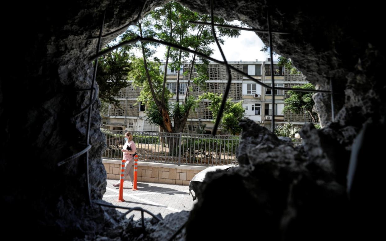 A residential building in Ashkelon that was damaged by a rocket launched overnight from the Gaza Strip - AMIR COHEN /REUTERS