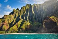 Kauai has one of the world's most <a href="https://www.cntraveler.com/galleries/2015-09-29/the-worlds-most-insanely-beautiful-coastlines?mbid=synd_yahoo_rss" rel="nofollow noopener" target="_blank" data-ylk="slk:gorgeous coastlines" class="link ">gorgeous coastlines</a>, with towering waterfalls and isolated crescent beaches. Just be prepared to put in a little effort to soak up its wonders: Na Pali can only be seen from a helicopter, catamaran, or a rather grueling hike.