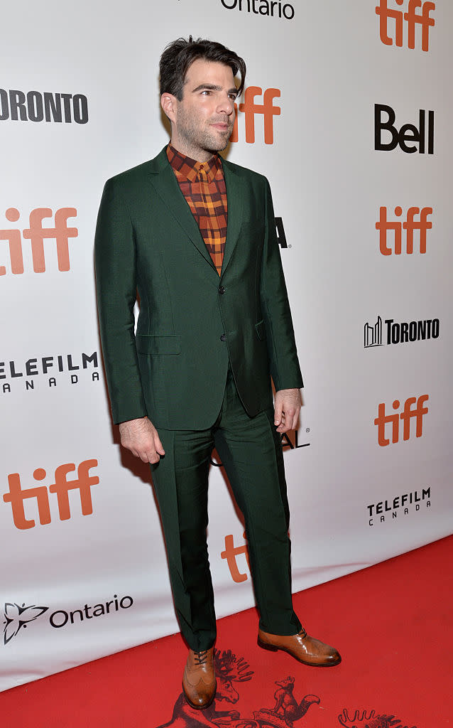 <p>Men’s fashion can become a little too run of the mill sometimes – black suit, white shirt, tie. We loved to see Zachary Quinto go big with a hunter green suit and colourful check shirt on the “Snowden” red carpet. (<i>Photo by GP Images/WireImage)</i></p>