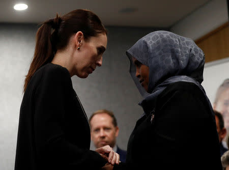 New Zealand’s Prime Minister Jacinda Ardern meets with one of the first responders who was at the scene of the Christchurch mosque shooting. Source: Reuters