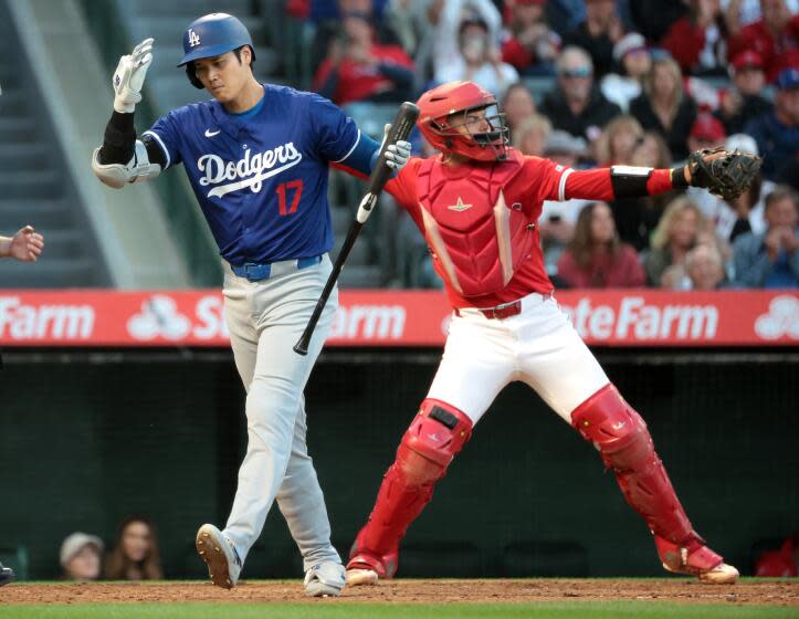 ANAHEIM, CALIFORNIA - MARCH 26: Dodgers Shohei Ohtani strikes out in the fourth inning.