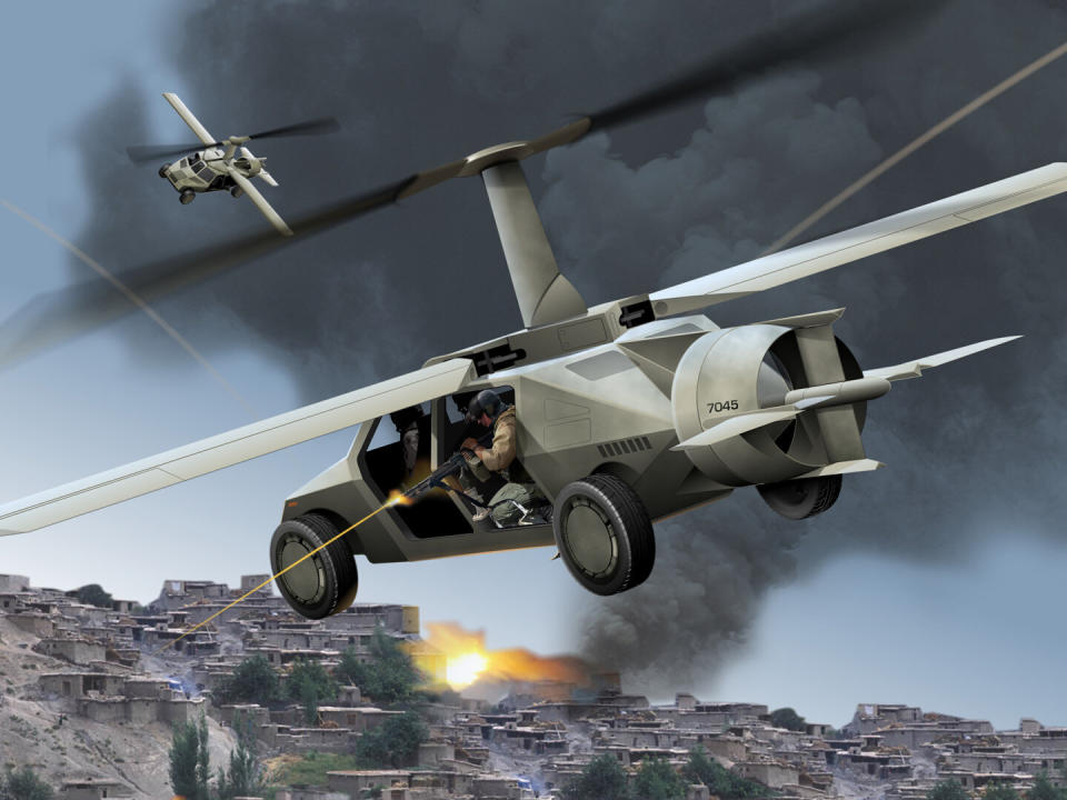 A Transformer gunship concept by TEXTRON, is part of a U.S. Defense Advanced Research Projects Agency (DARPA) project of studying the feasibility of a vertical take-off and landing (VTOL), road-worthy vehicles capable of carrying four combatants on road and in the air for distances in the form of  a flying HUMMVEE (High Mobility Multipurpose Wheeled Vehicle). This is one of many items displayed in the Chapter on the Future of U.S. Naval Special Warfare / U.S Navy SEAL.  Graphic:  Courtesy of the Textron Corporation.
