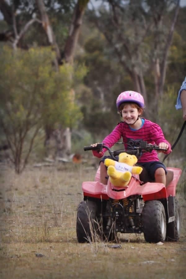 Sophie riding her friend's quad bike. Photo: Facebook