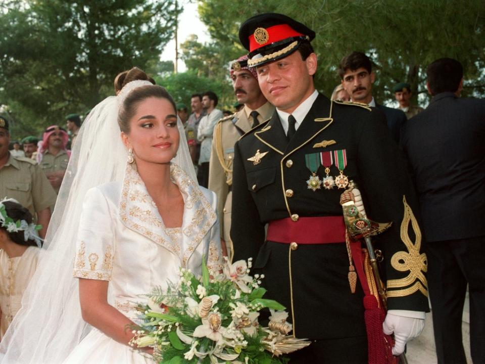King Abdullah II and Queen Rania of Jordan after their wedding ceremony at the Royal Palace in Amman on 10 June ,1993 (Rabih Moghrabi/AFP via Getty)