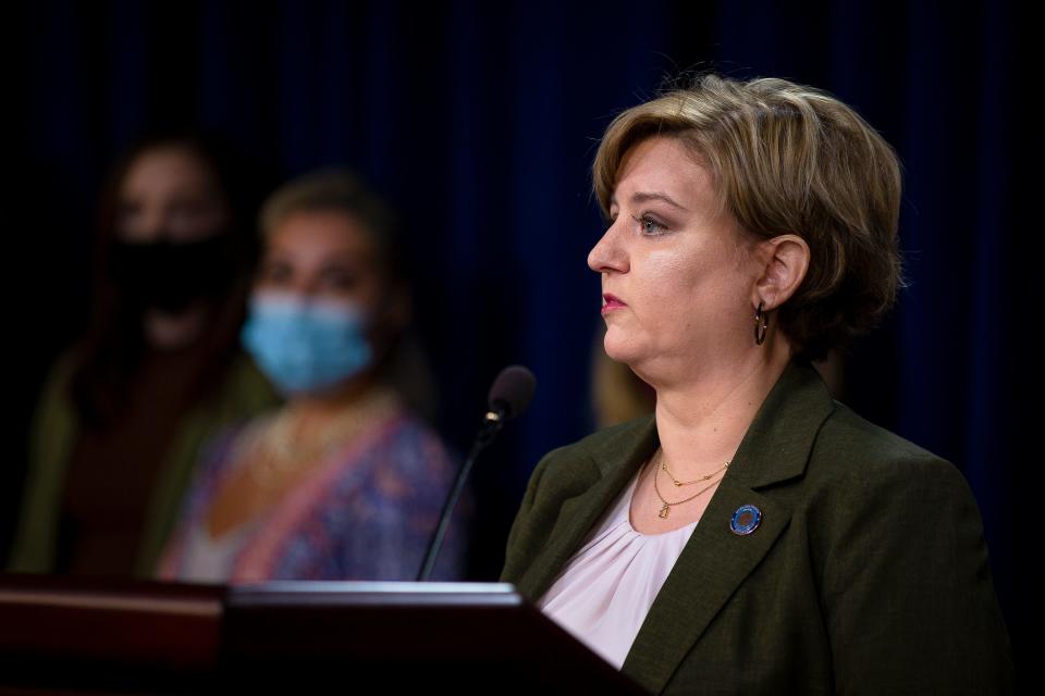 Maricopa County attorney Allister Adel speaks during a press conference, approving a national opioid settlement, in Phoenix on Oct. 20, 2021.