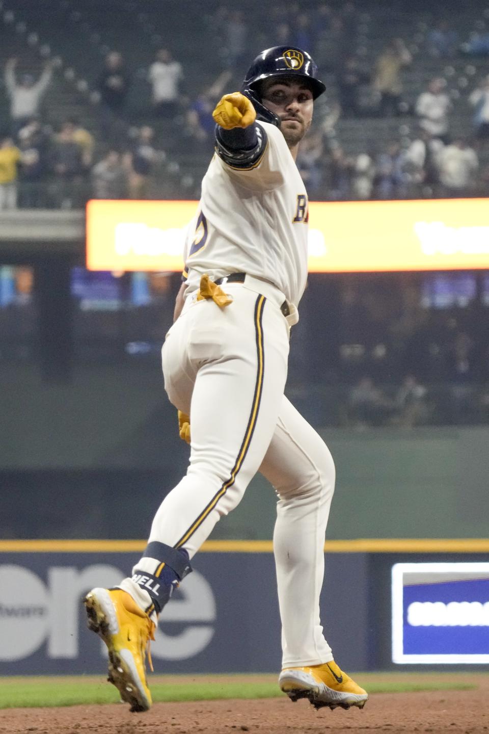 Milwaukee Brewers' Garrett Mitchell celebrates after hitting a home run during the sixth inning of a baseball game against the New York Mets Tuesday, April 4, 2023, in Milwaukee. (AP Photo/Morry Gash)