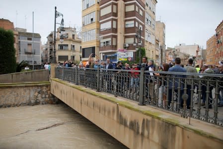 Spain's acting Prime Minister Pedro Sanchez and and Interior Minister Fernando Grande-Marlaska visit the bridge over Segura river in a flooded town of Orihuela