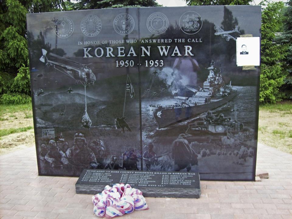 A stone memorial commemorating locals who fought and died in the Korean War is seen after being unveiled at Ross County Veterans Memorial Park in Chillicothe, Ohio, in this May 28, 2014 handout provided by Tina Kutschbach. The black granite slab which was unveiled this week to honor Americans who fought and died in the Korean War has drawn calls for it to be replaced because of glaring omissions and historical inaccuracies including images from the Vietnam War and Desert Storm. REUTERS/Tina Kutschbach/Handout via Reuters (UNITED STATES - Tags: MILITARY SOCIETY) ATTENTION EDITORS - THIS PICTURE WAS PROVIDED BY A THIRD PARTY. REUTERS IS UNABLE TO INDEPENDENTLY VERIFY THE AUTHENTICITY, CONTENT, LOCATION OR DATE OF THIS IMAGE. FOR EDITORIAL USE ONLY. NOT FOR SALE FOR MARKETING OR ADVERTISING CAMPAIGNS. THIS PICTURE IS DISTRIBUTED EXACTLY AS RECEIVED BY REUTERS, AS A SERVICE TO CLIENTS. NO SALES. NO ARCHIVES