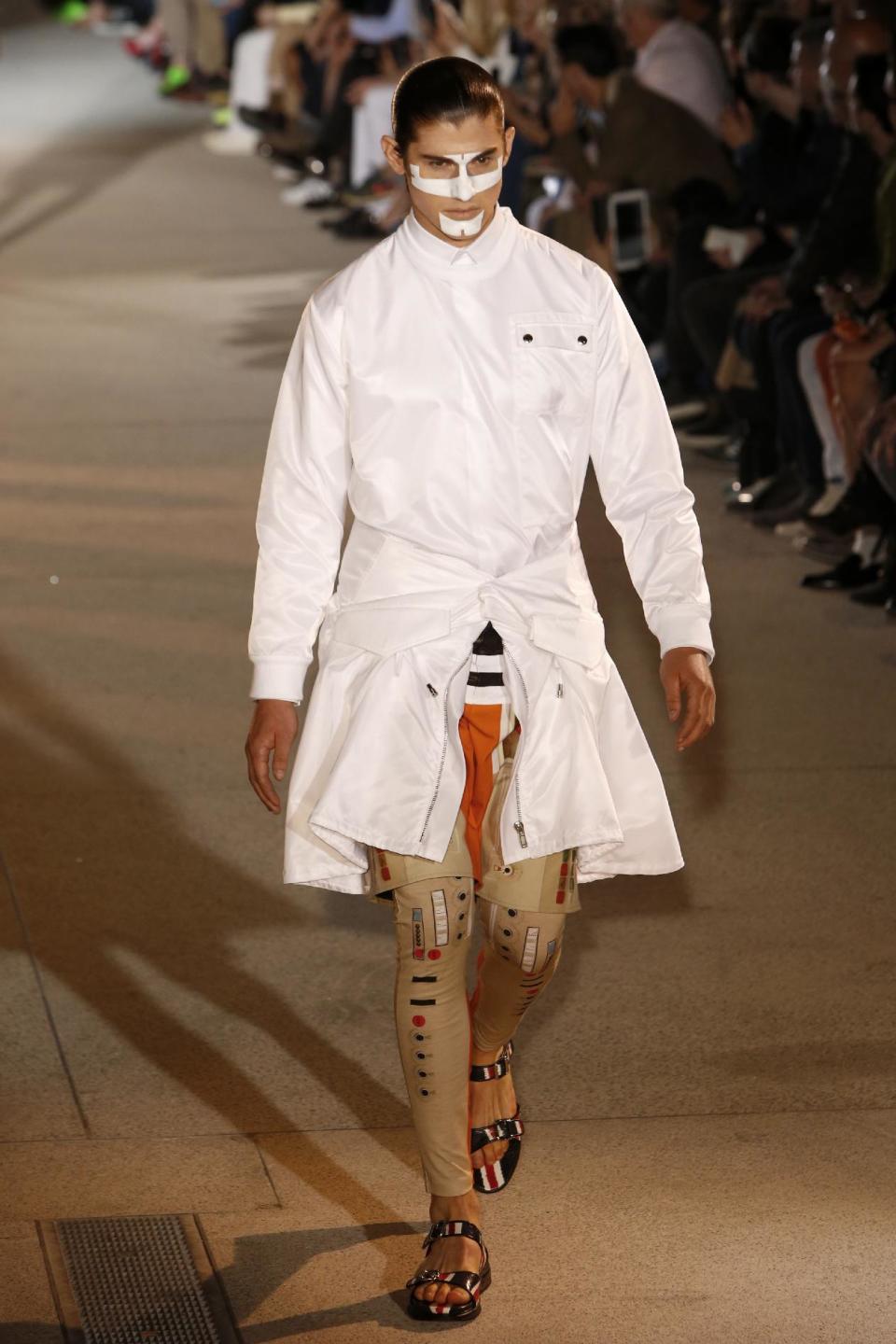 A model presents a creation as part of the Givenchy men's fashion Spring-Summer 2014 collection, presented Friday, June 28, 2013 in Paris. (AP Photo/Francois Mori)