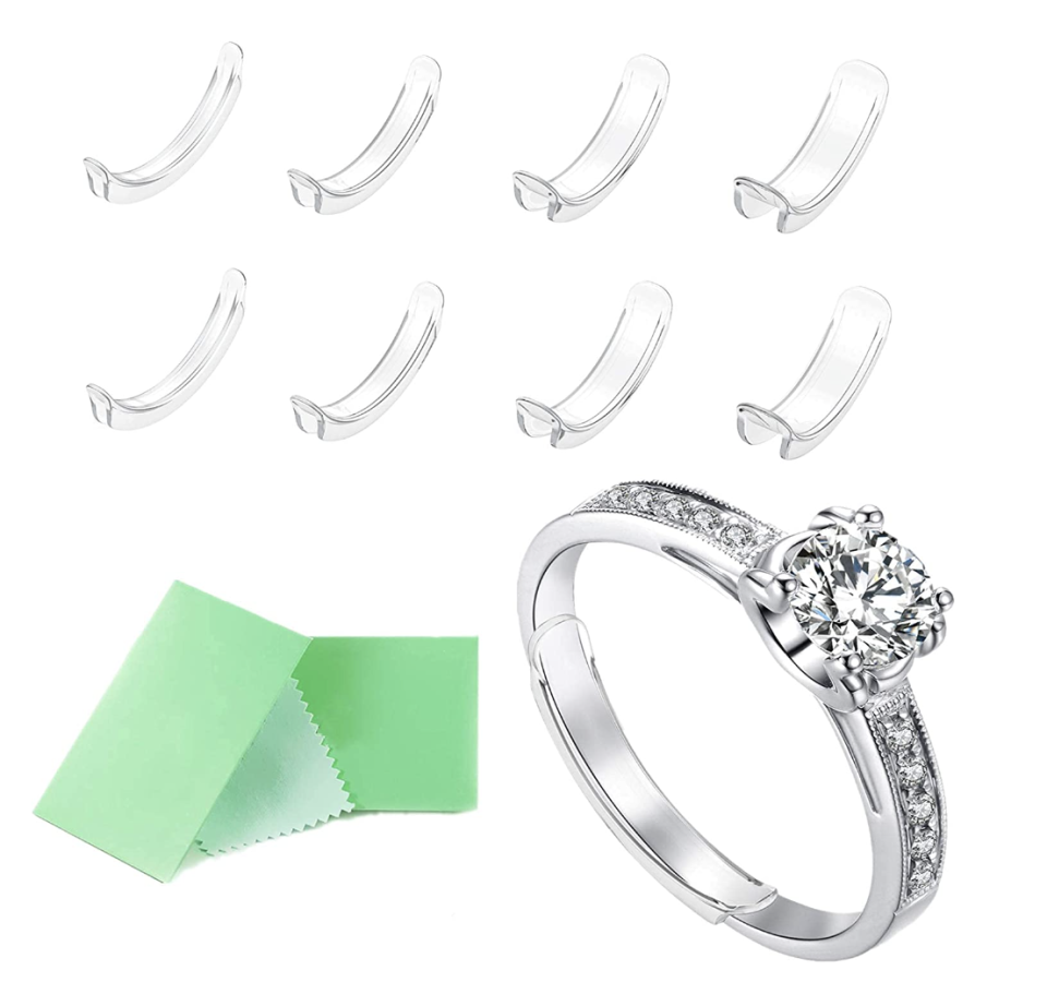 Invisible Ring Size Adjuster with diamond ring and green wipes (Photo via Amazon)