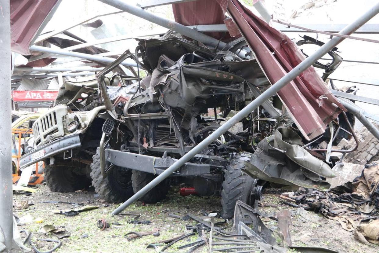 A vehicle destroyed by a Russian missile strike is seen at a compound of a fire depot of the State Emergency Service, amid Russia's attack on Ukraine, in Dnipro (via REUTERS)